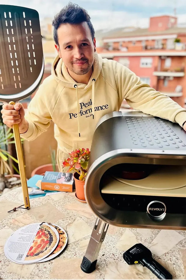 Chef Hector Alamos with Revolve Pizza Oven.